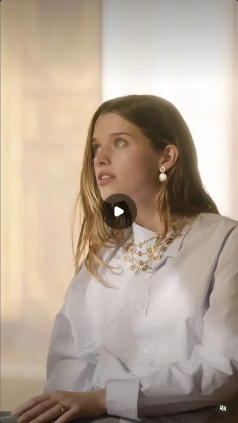A Dior jewelry film showing a woman wearing a necklace and earrings.